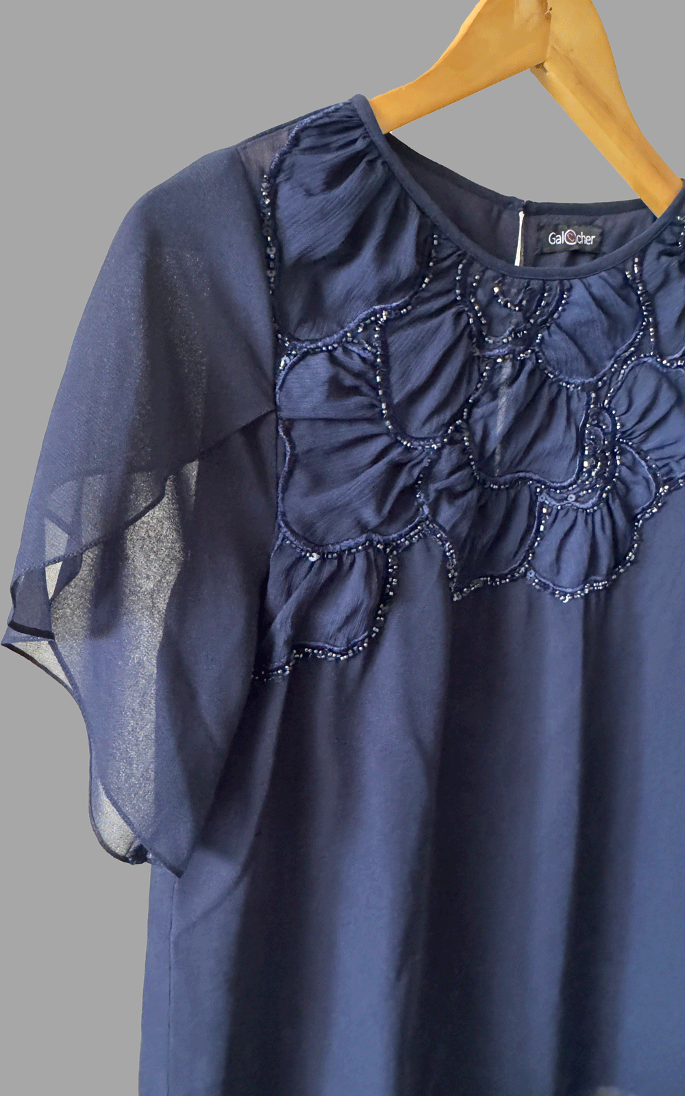 Floral fabric applique navy-blue top