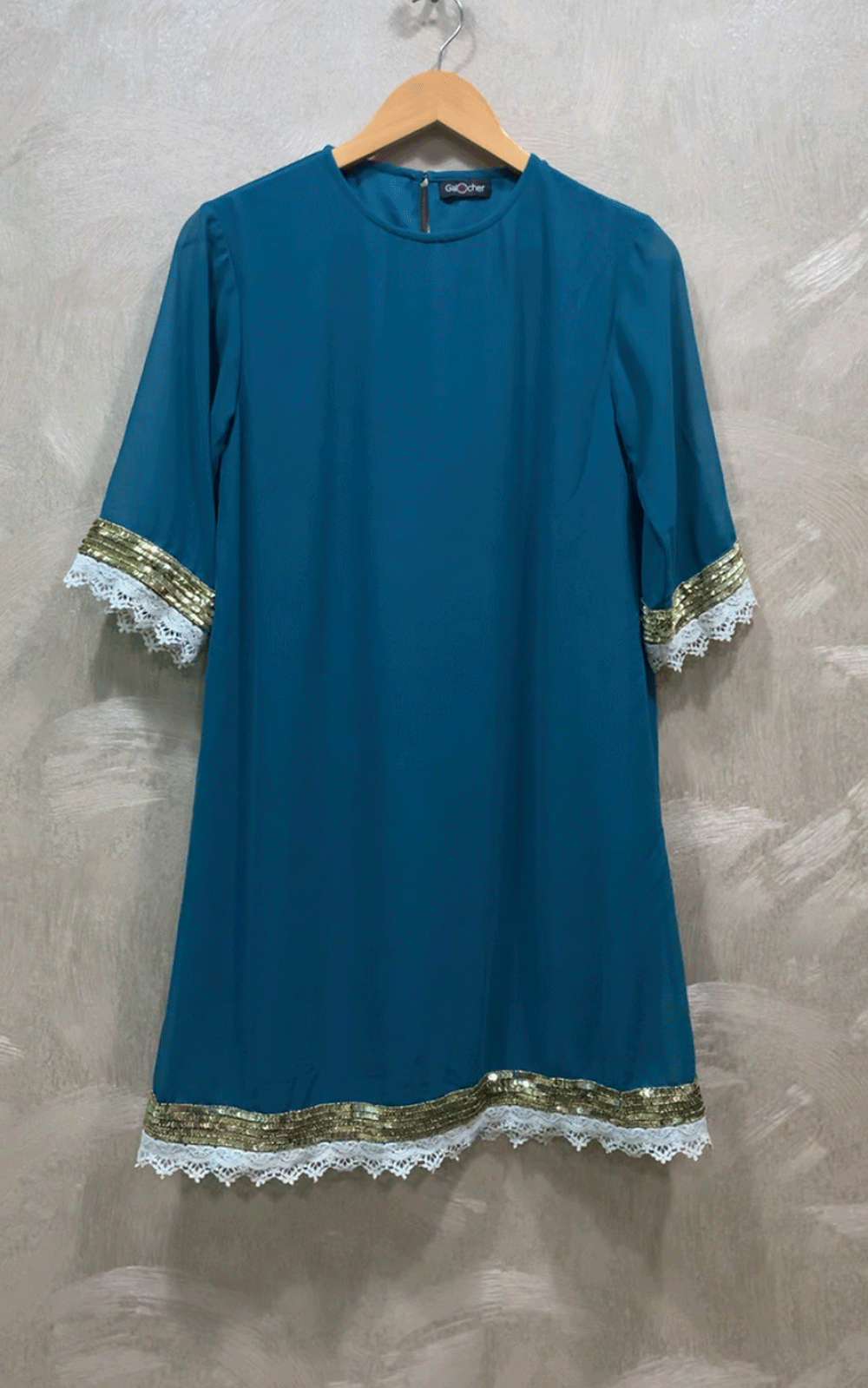 Teal green embroidered dress